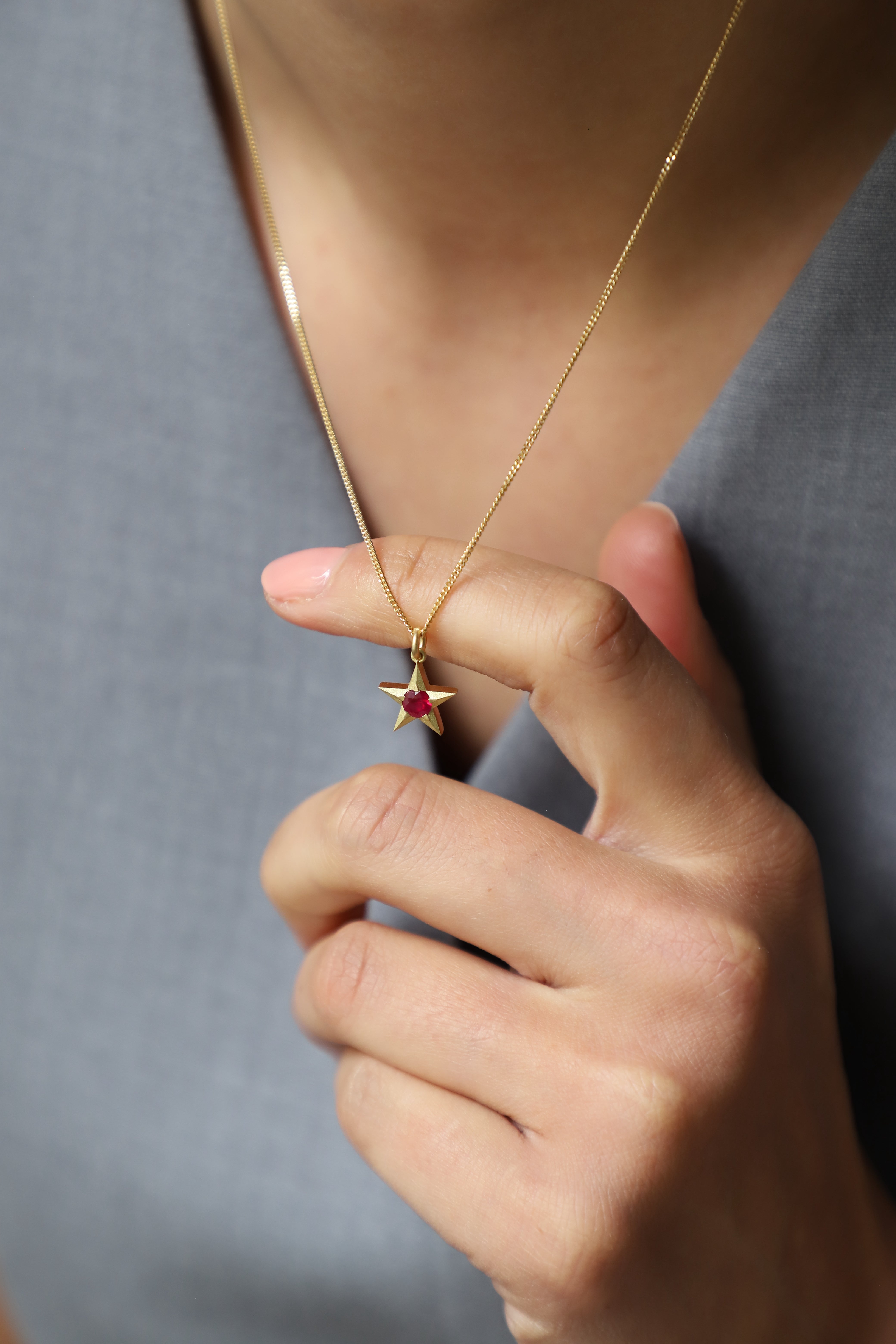 Stella 18ct Gold Star Necklace with Ruby